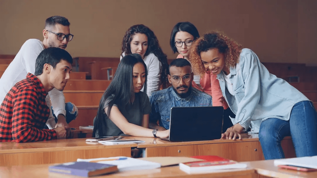 Students working together on a laptop